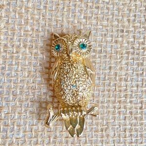 Goldtone owl perched on branch small brooch pin with green rhinestone eyes